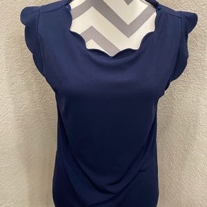 Monteau Scallop neck blouse.